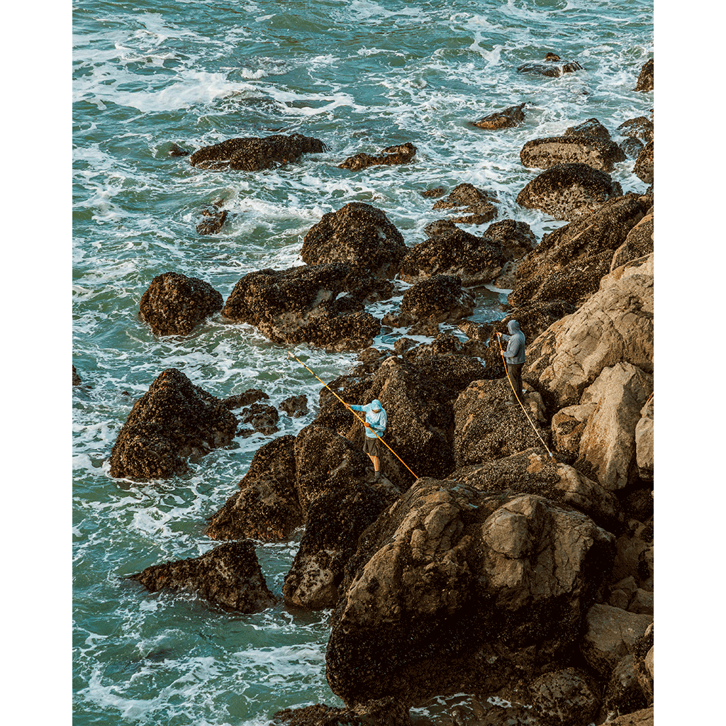 Fishermen On The Rocks